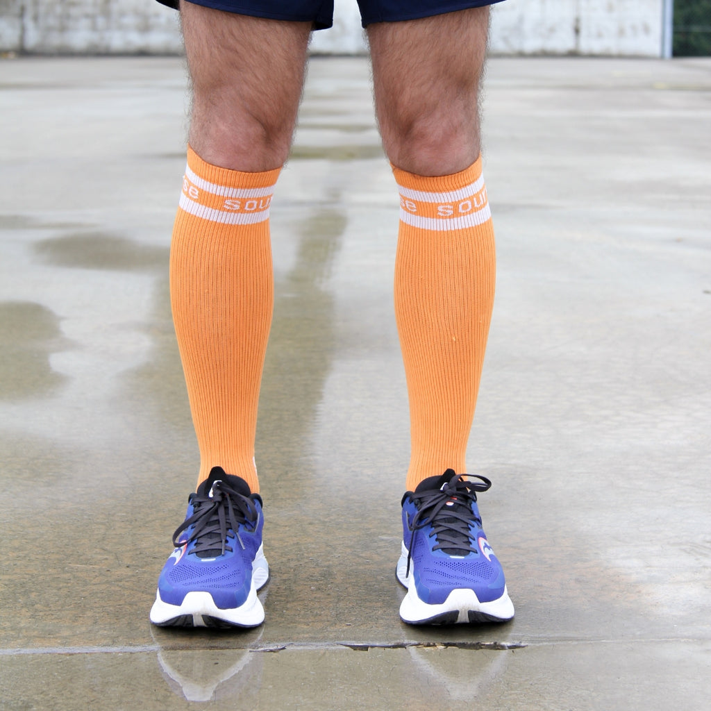 Spiridon chaussettes hautes de compression orange running unisexe free to run marathonien marathonienne (1)